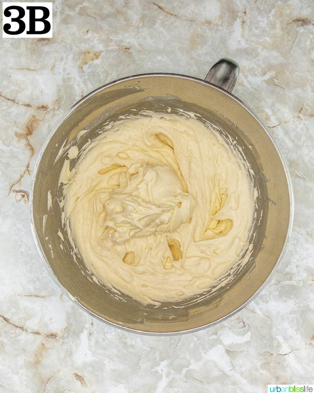 stand mixer bowl with batter.