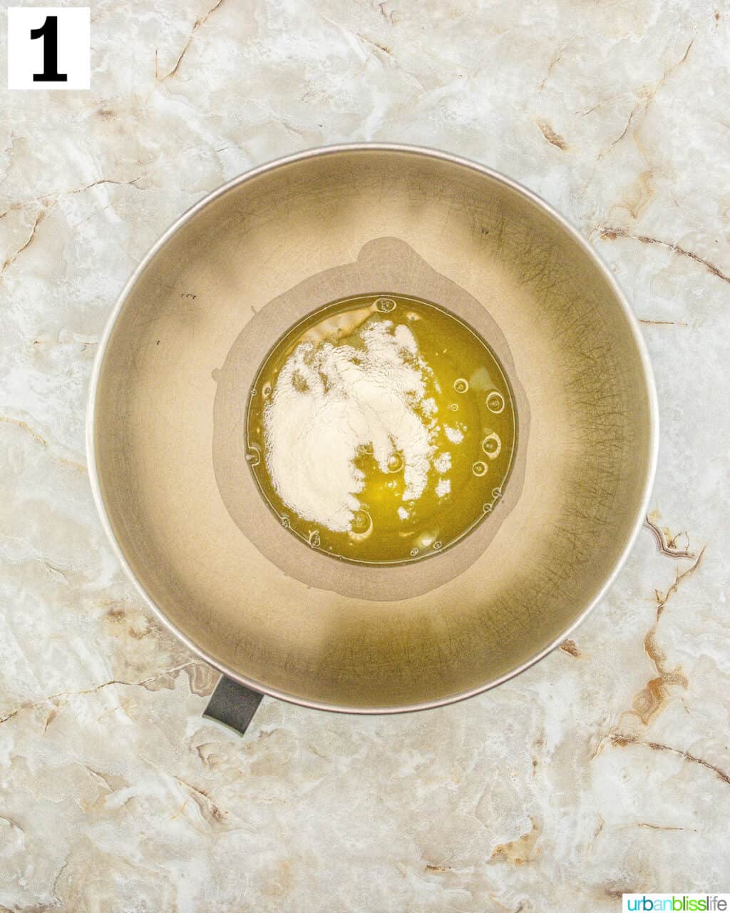 stand mixer bowl with batter.