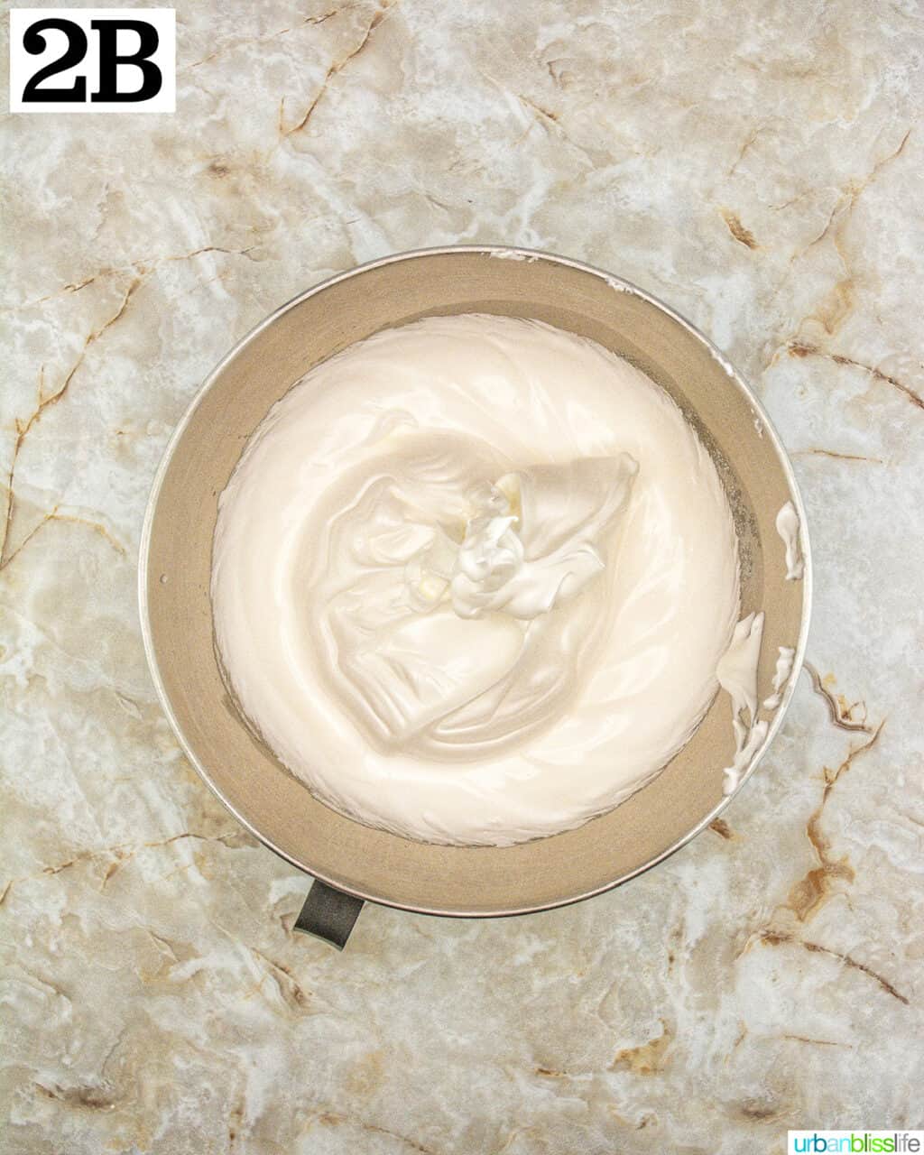stand mixer bowl with batter.