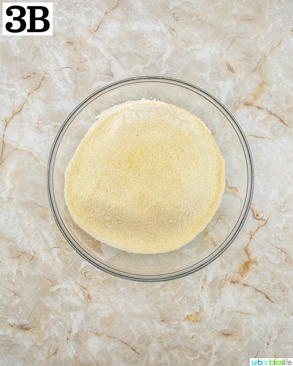 stand mixer bowl with batter.