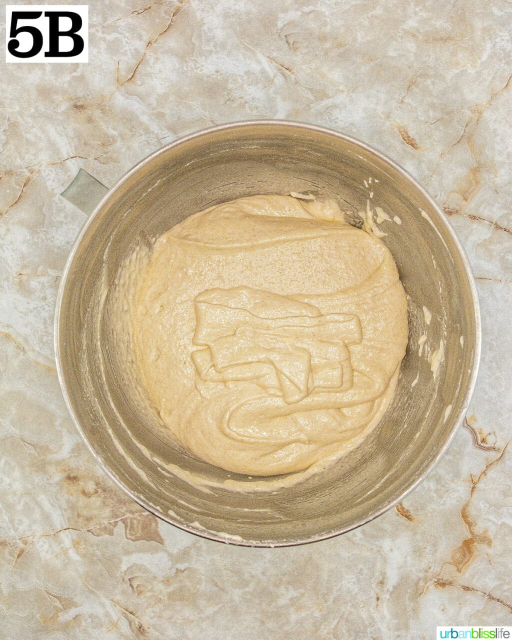 stand mixer bowl with batter.