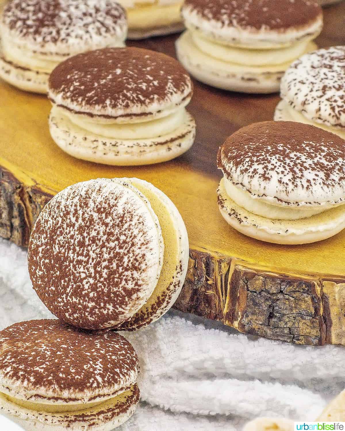 stacks of tiramisu macaron cookies.