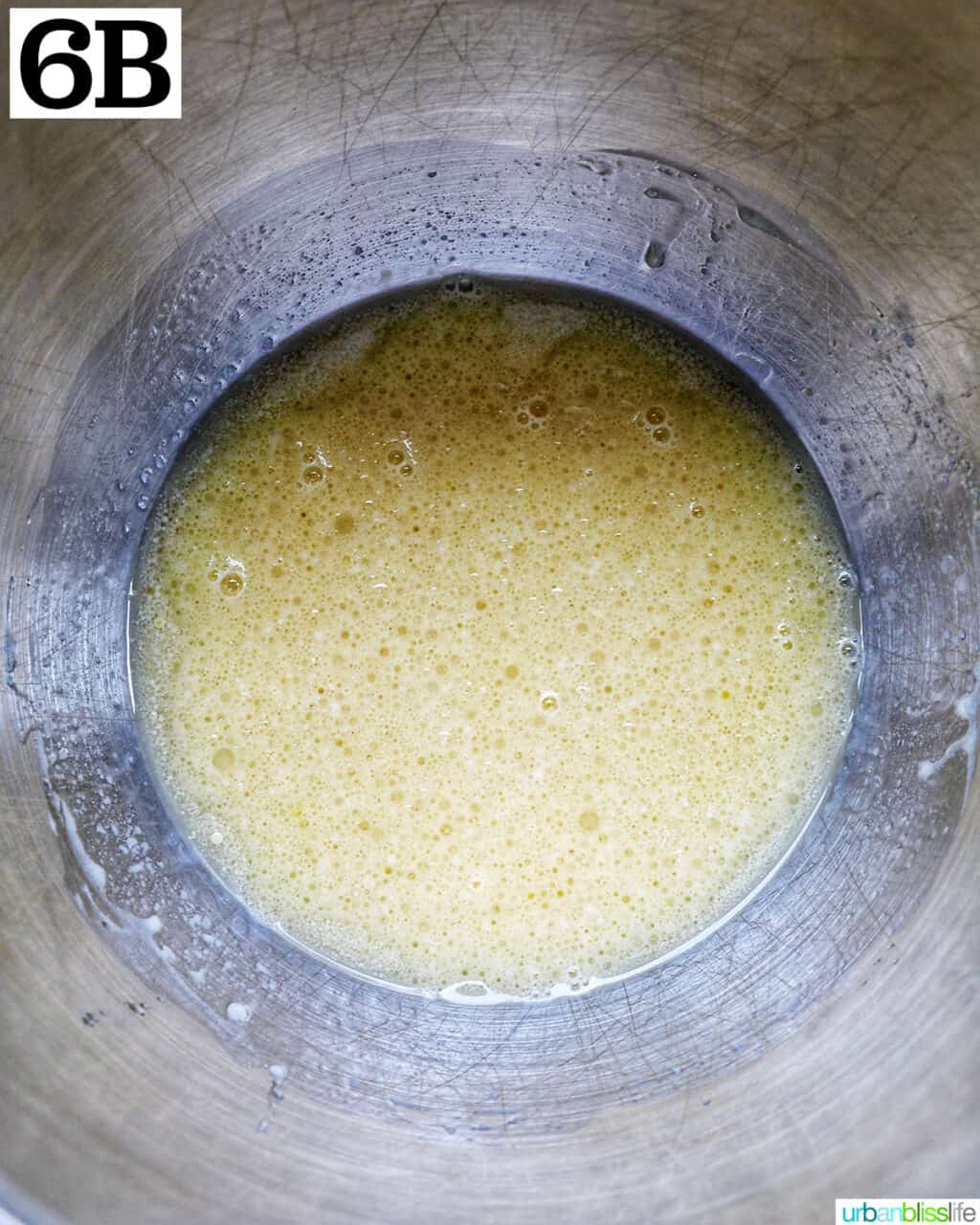 bowl of a stand mixer with wet ingredients to make chocolate fudge cupcakes.