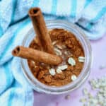 cinnamon roll overnight oats in a mason jar.