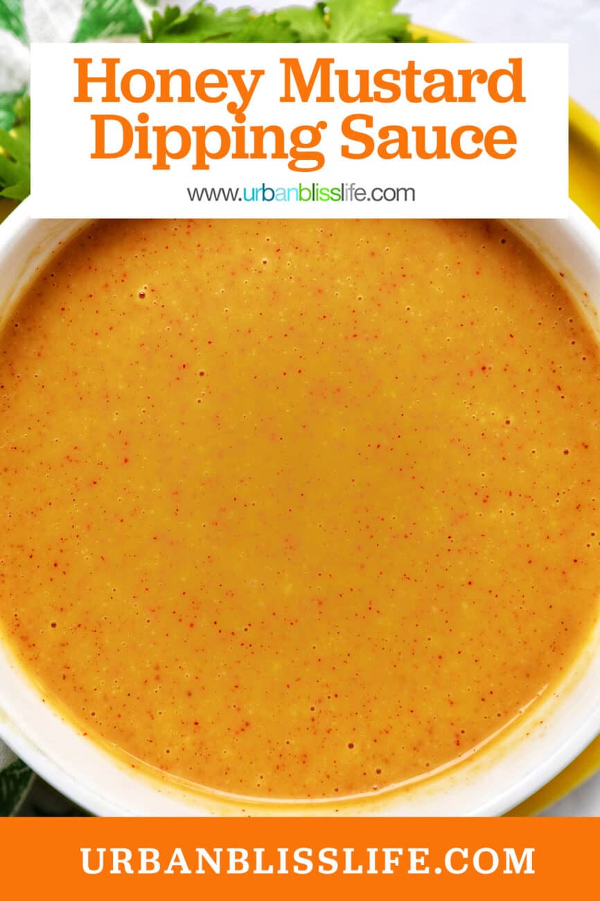 bowl of hand dipping a chicken tender into a bowl of honey mustard dipping sauce with title text overlay.
