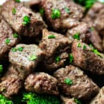 air fryer steak bites with chopped parsley garnish.