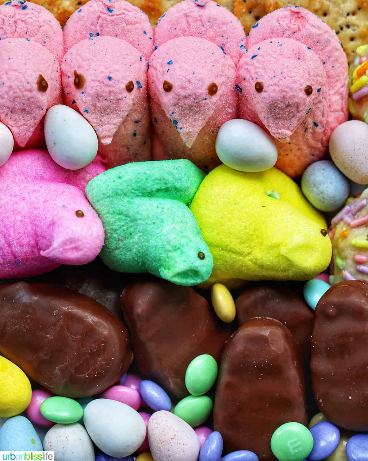 pink Peeps, yellow Peeps, green Peeps and chocolate covered eggs.