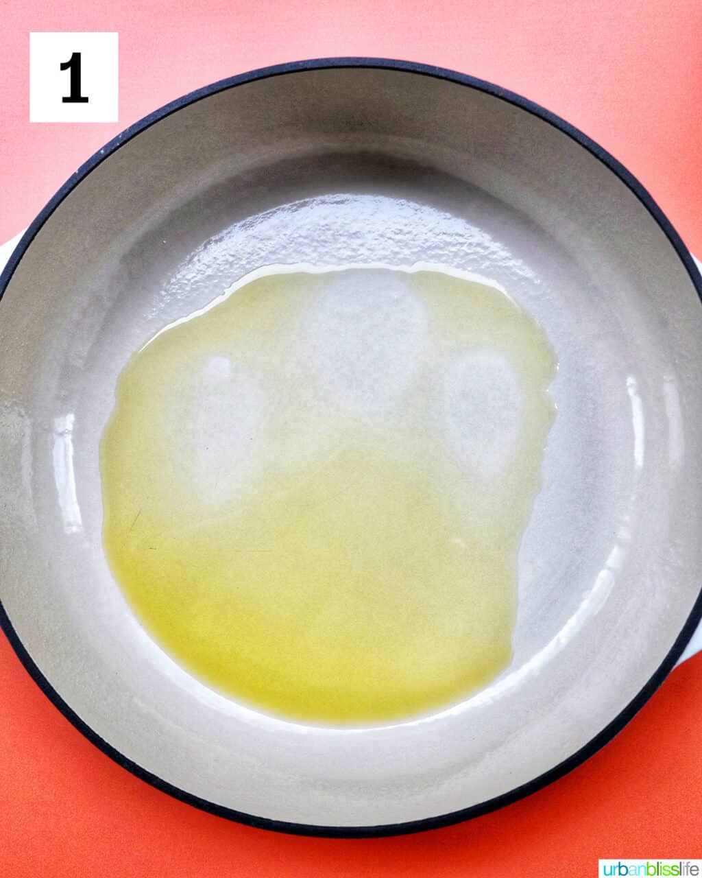 olive oil in a large white pan.
