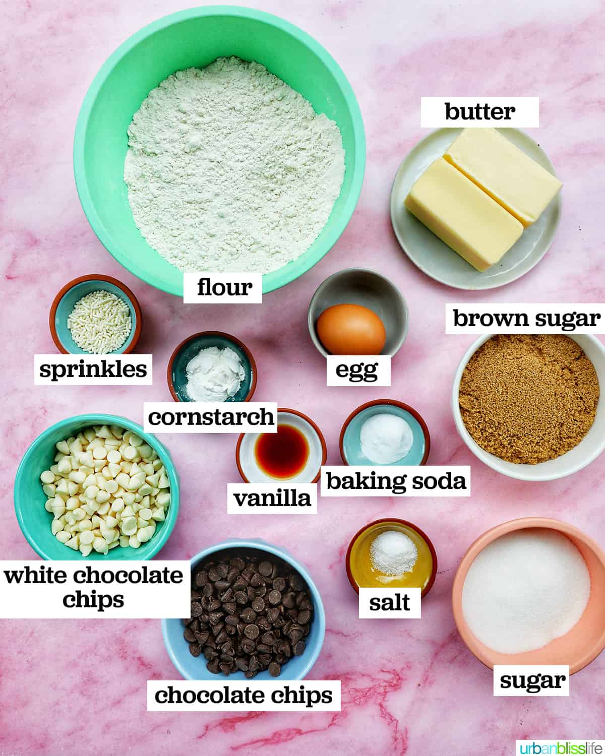 bowls of ingredients to make Valentines cookie cakes.