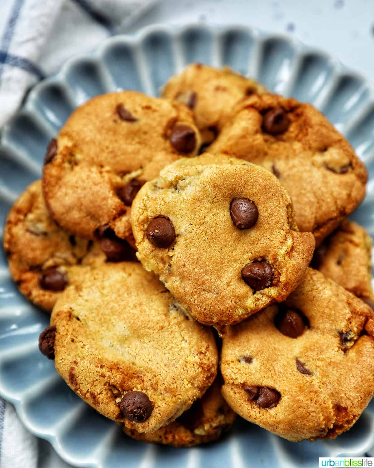 stack of air fryer chocolate chip cookies on a plate.
