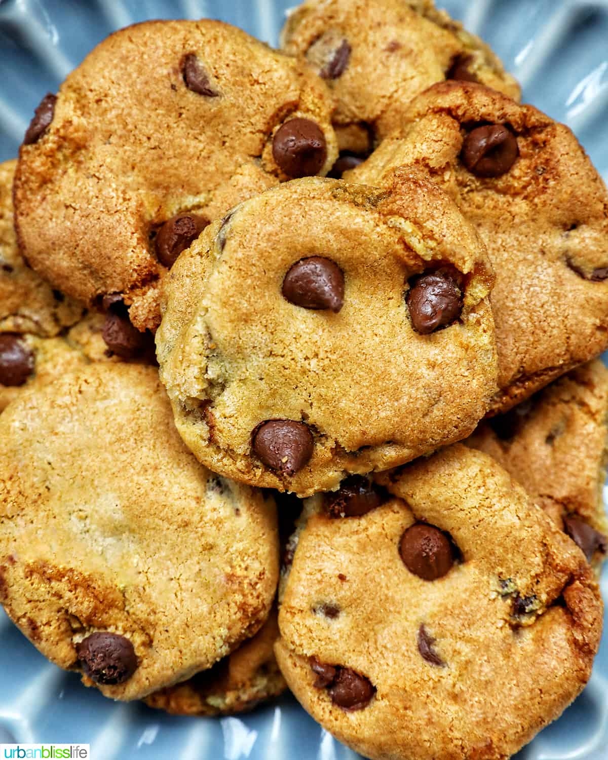 stack of air fryer chocolate chip cookies on a plate.