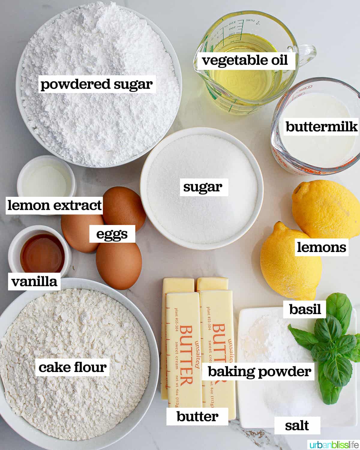 bowls of baking ingredients to make lemon basil cupcakes.
