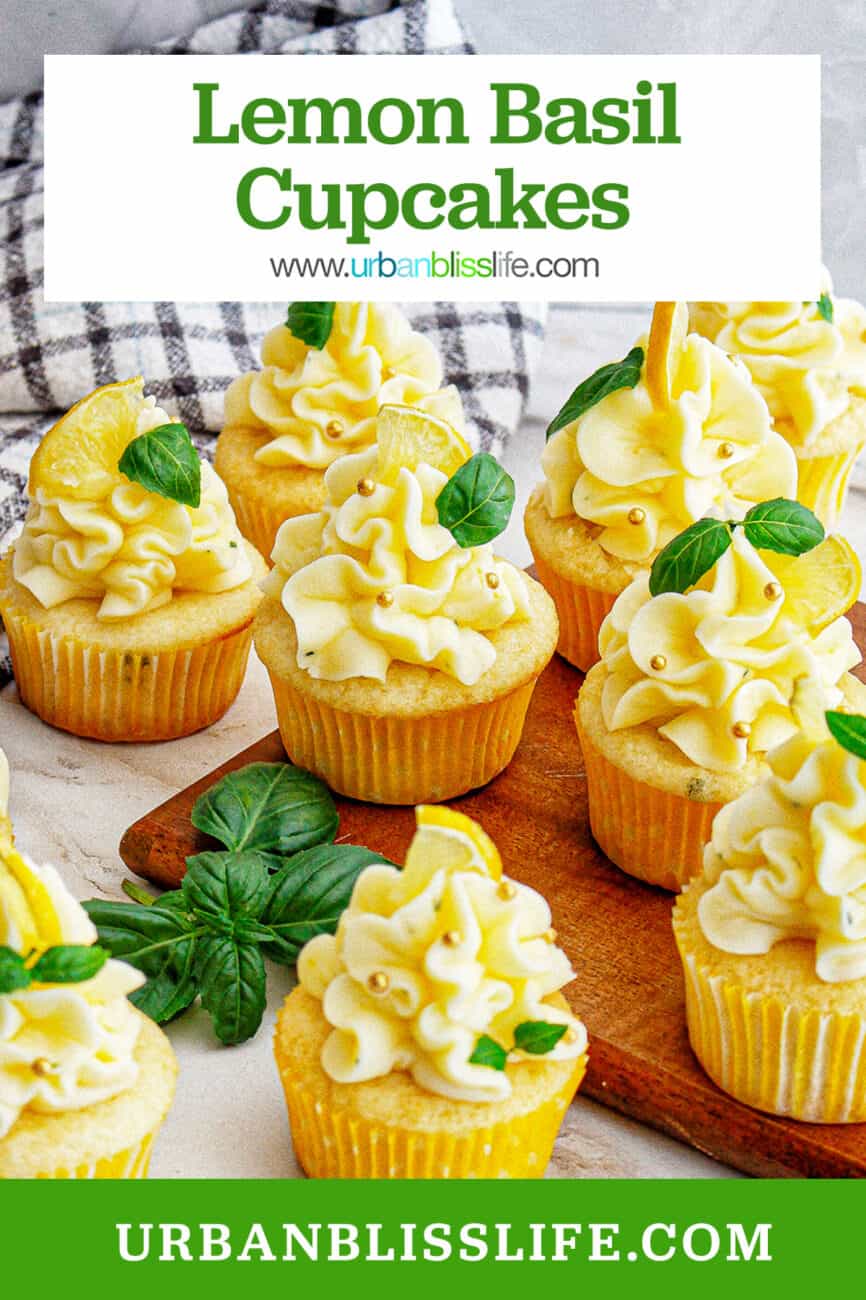 group of lemon basil cupcakes with lemon buttercream frosting and garnish of basil leaves and lemon slice with title text overlay.