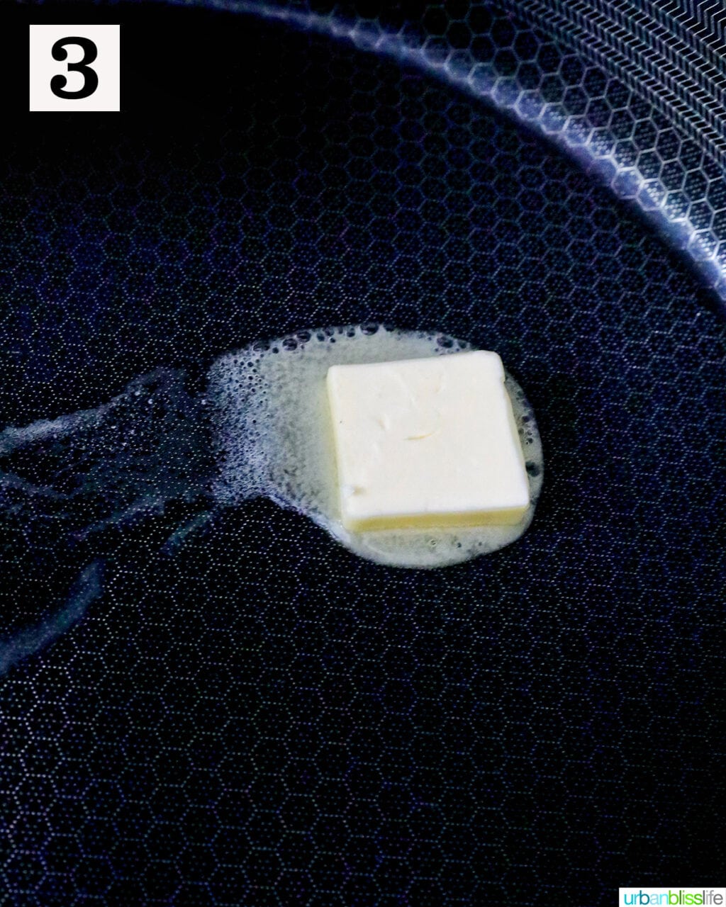 pat of butter melting in a pan.