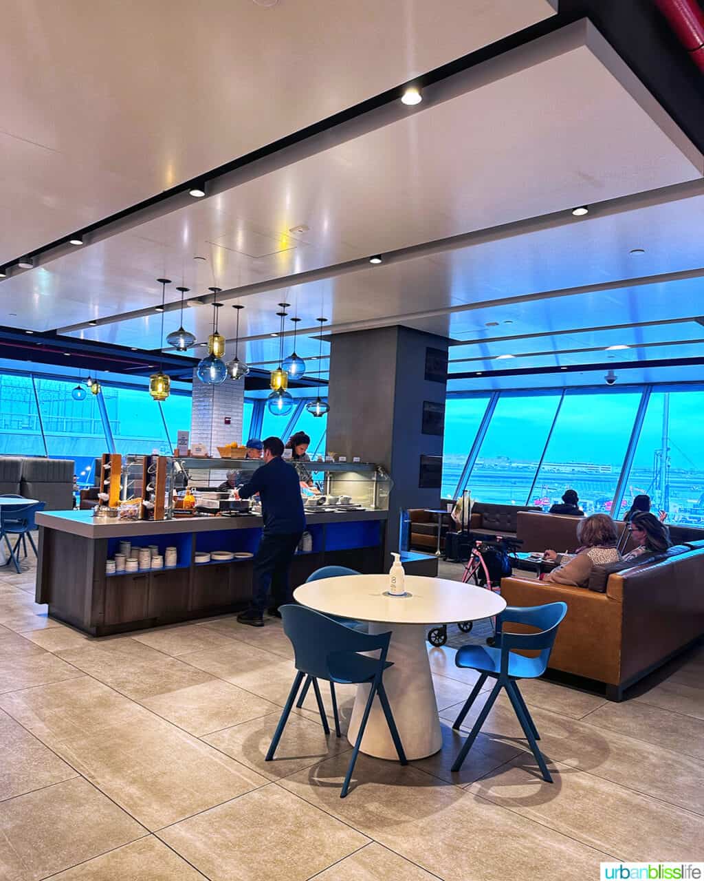 buffet and seating at Alaska Airlines Lounge in JFK Airport.