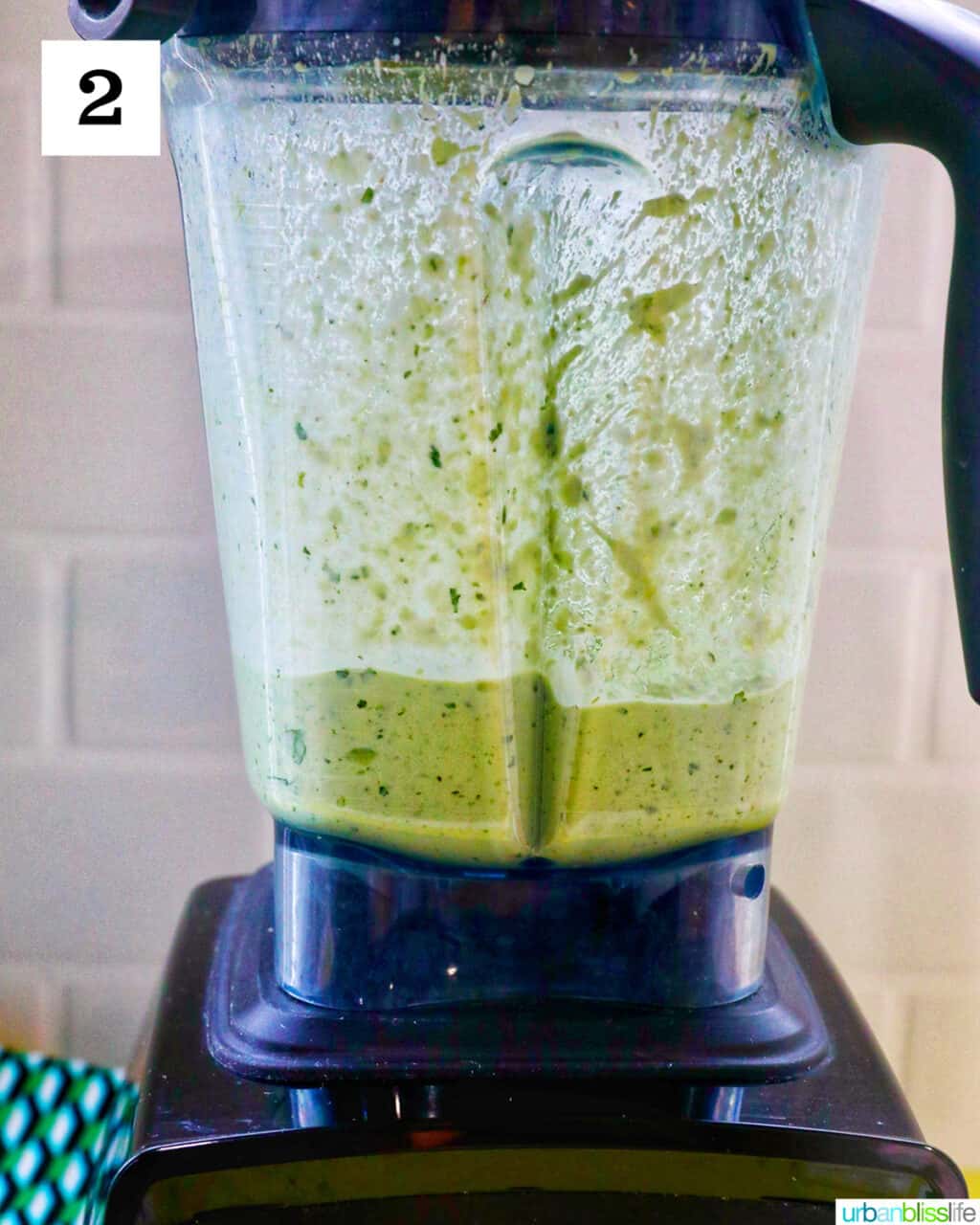 avocado cilantro lime crema in a blender.