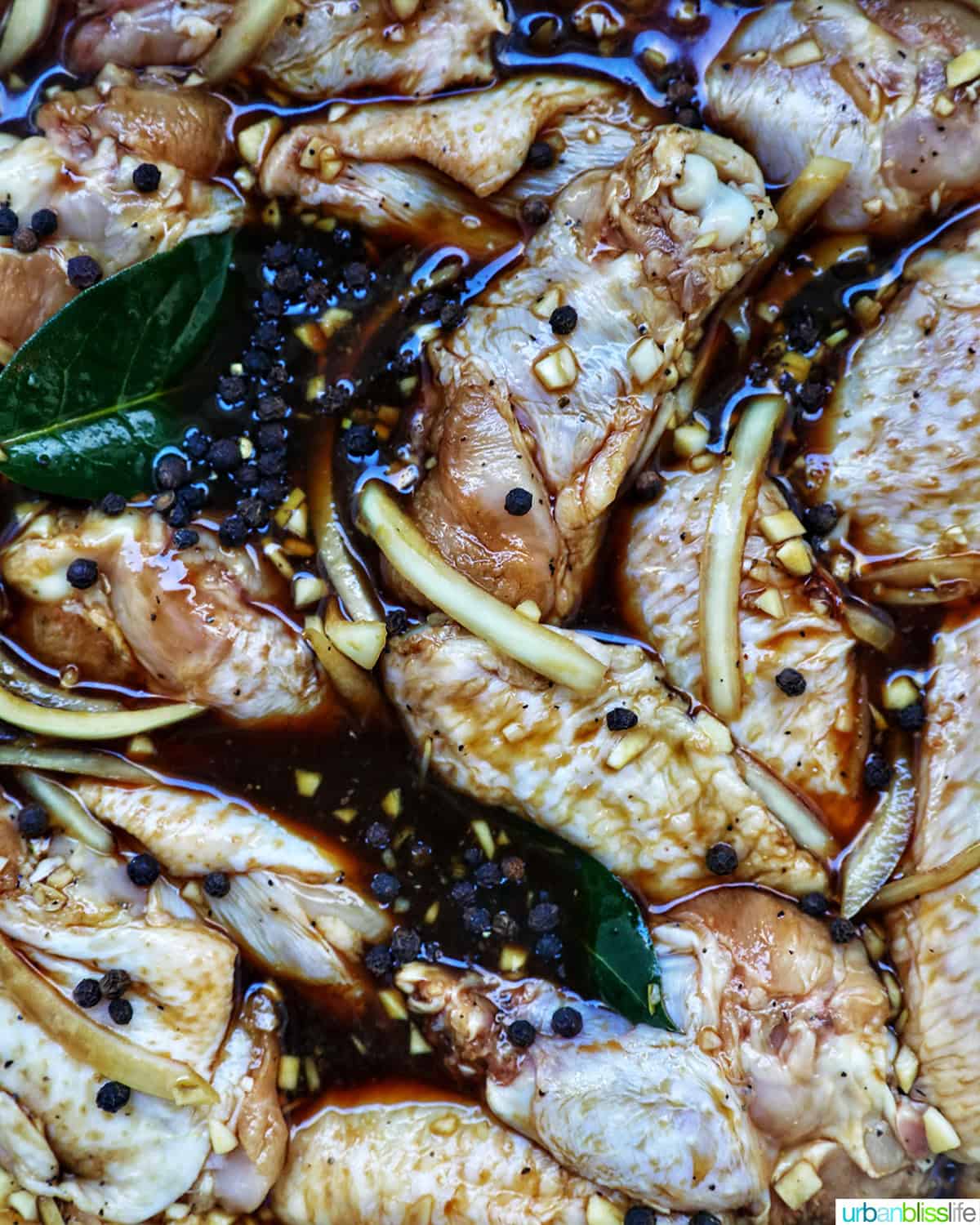 chicken wings in Filipino adobo marinade.