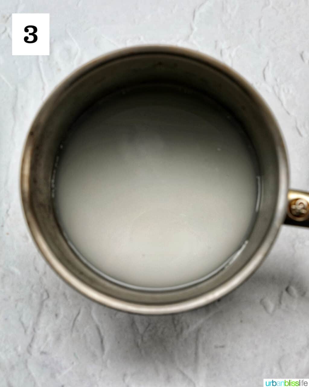 saucepan with water and sugar.