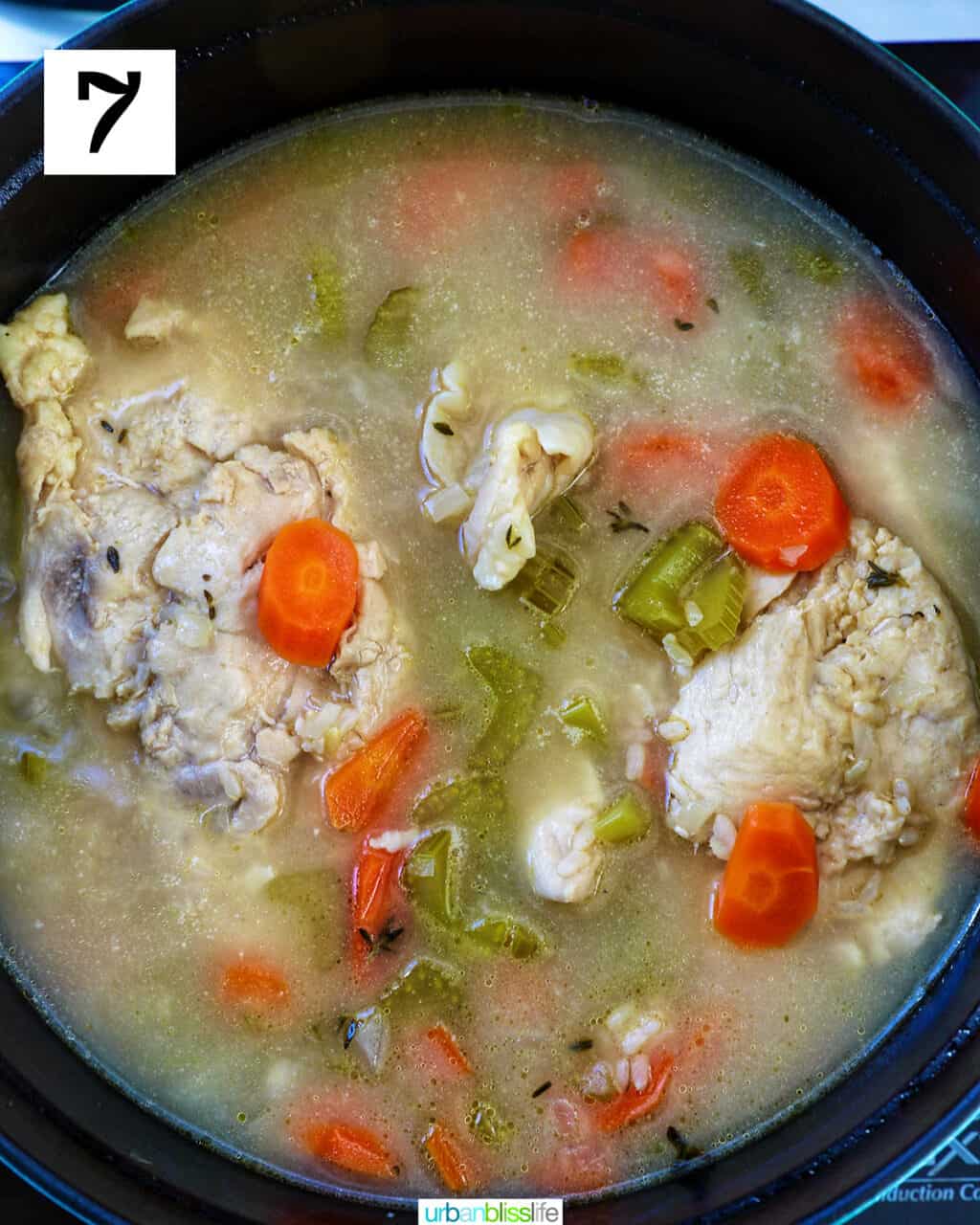cooked chicken soup in a large pot.