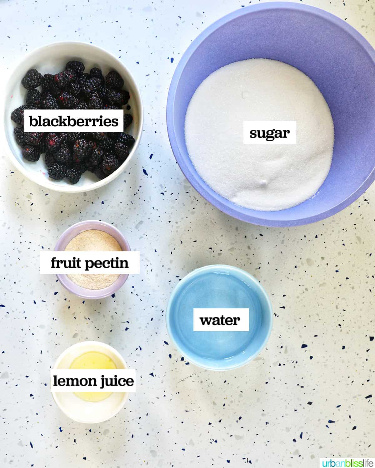 bowls of ingredients to make blackberry freezer jam.