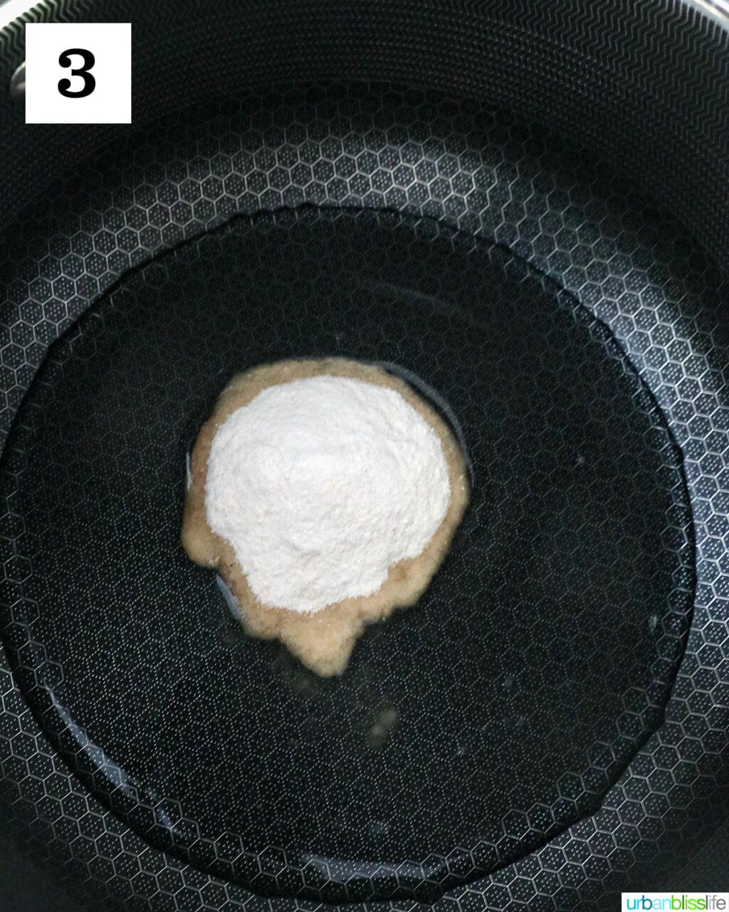powdered fruit pectin added to water in a saucepan.