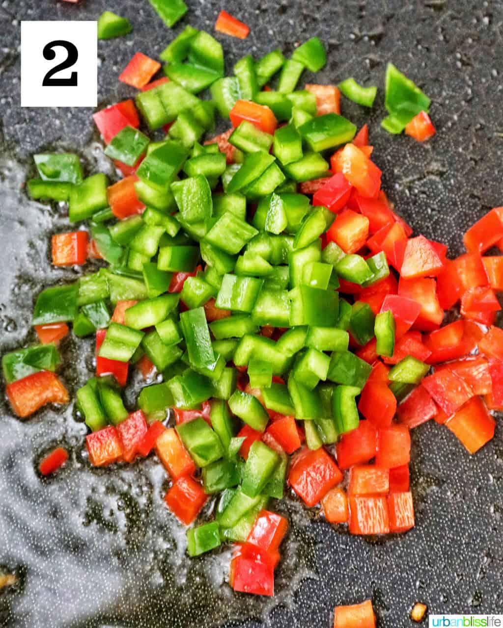 red bell peppers and green bell peppers in a skillet.