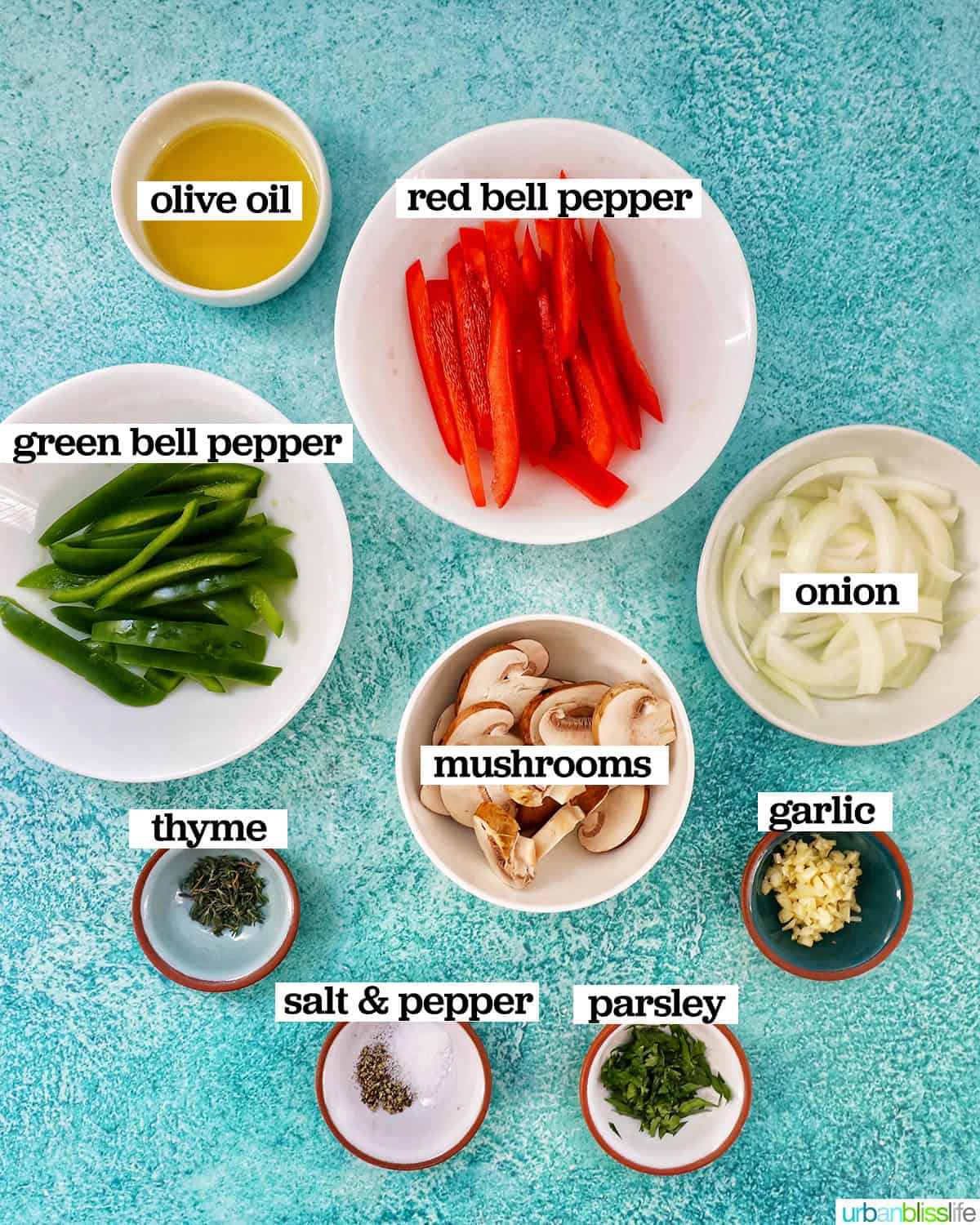 bowls of ingredients to make sautéed peppers and onions.