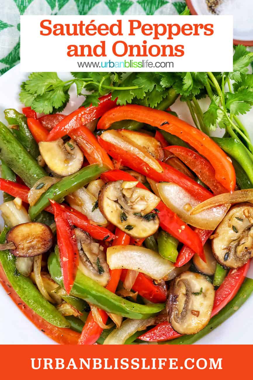 sautéed peppers and onions in a white bowl with garnish of parsley.