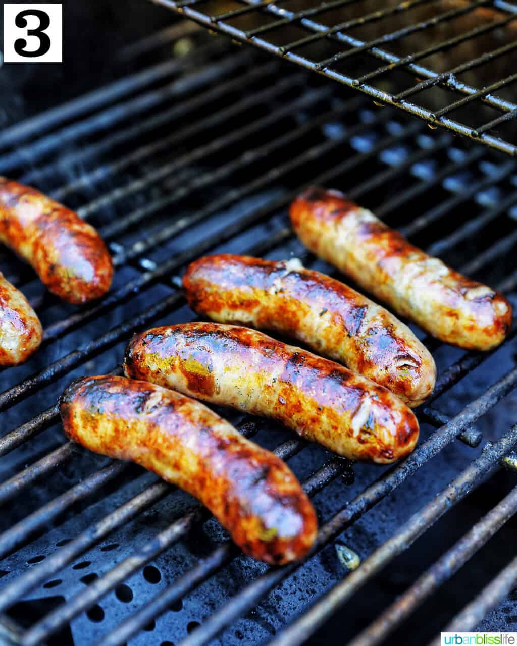 cooked brats on a grill