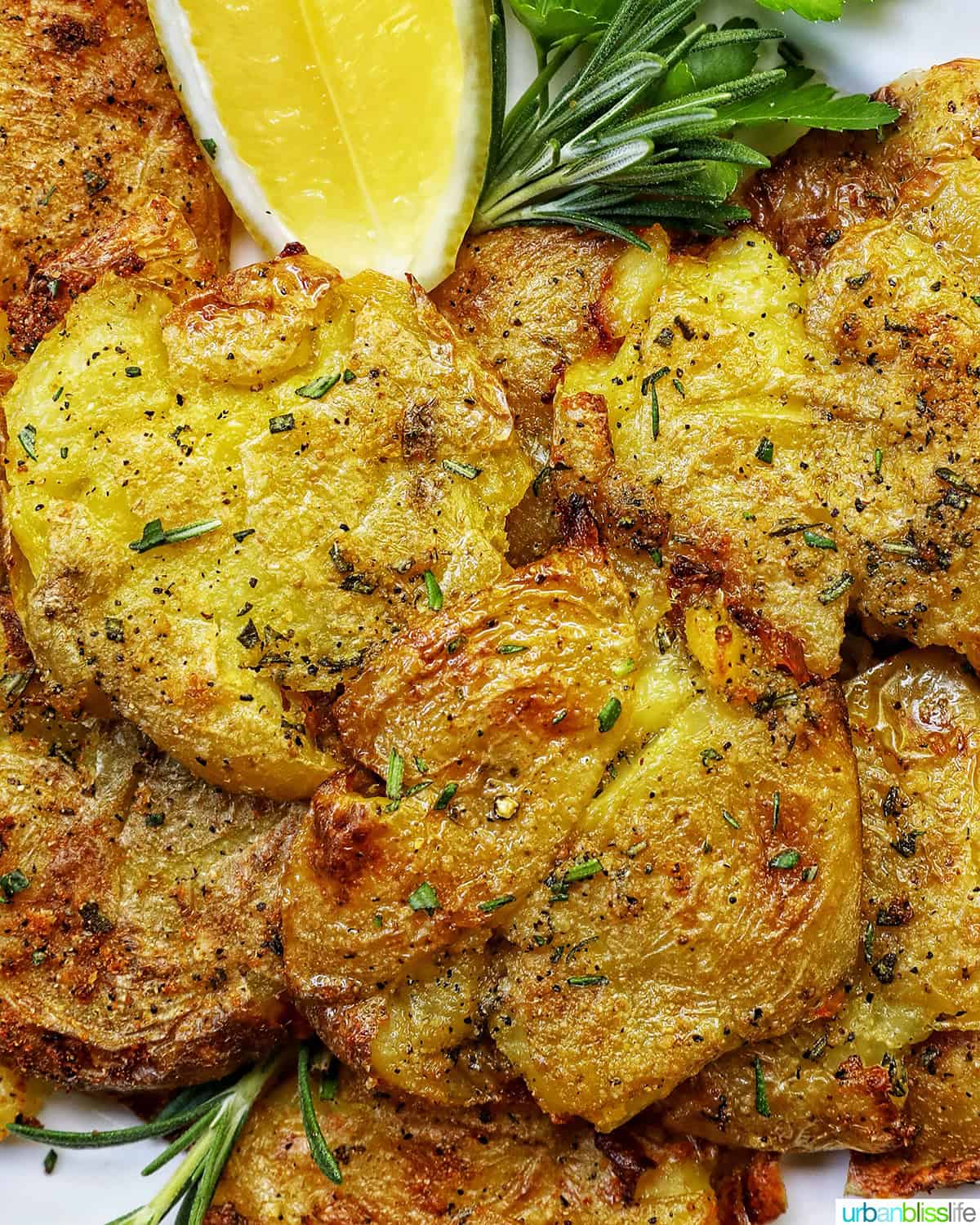 smashed potatoes on a plate.