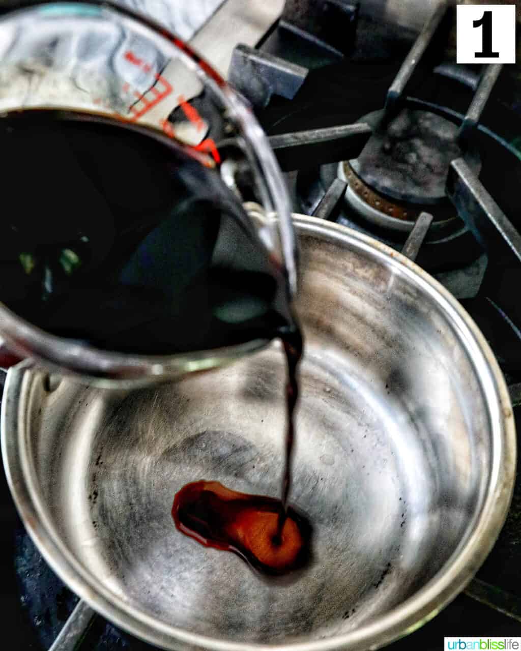 pouring balsamic vinegar into a saucepan.