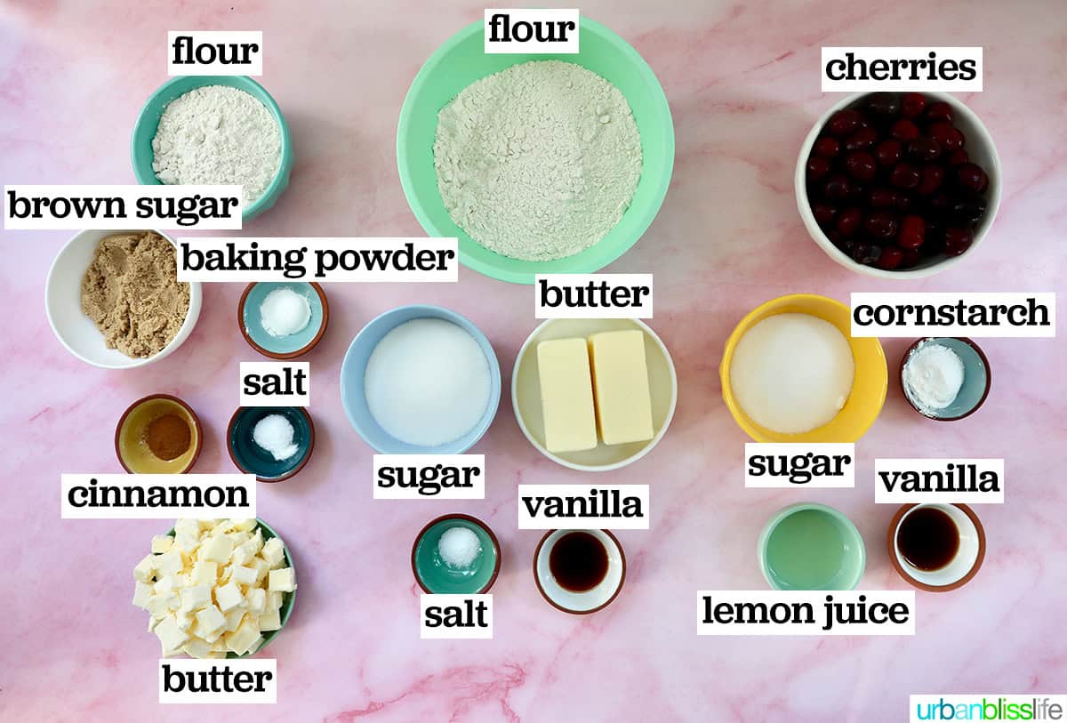 bowls of several ingredients to make cherry crumble bars.
