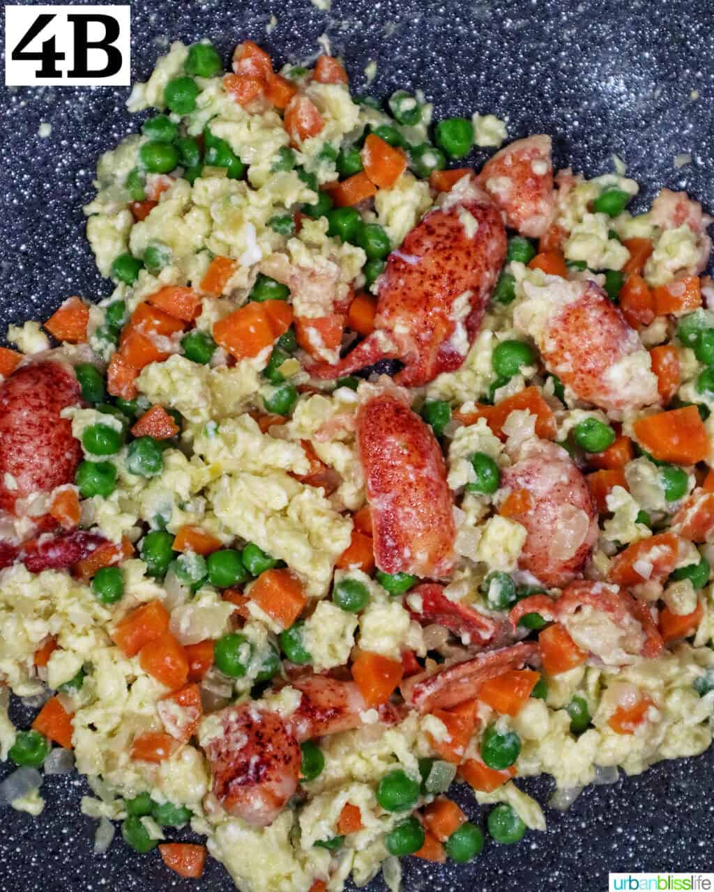 wok with lobster fried rice ingredients in it.