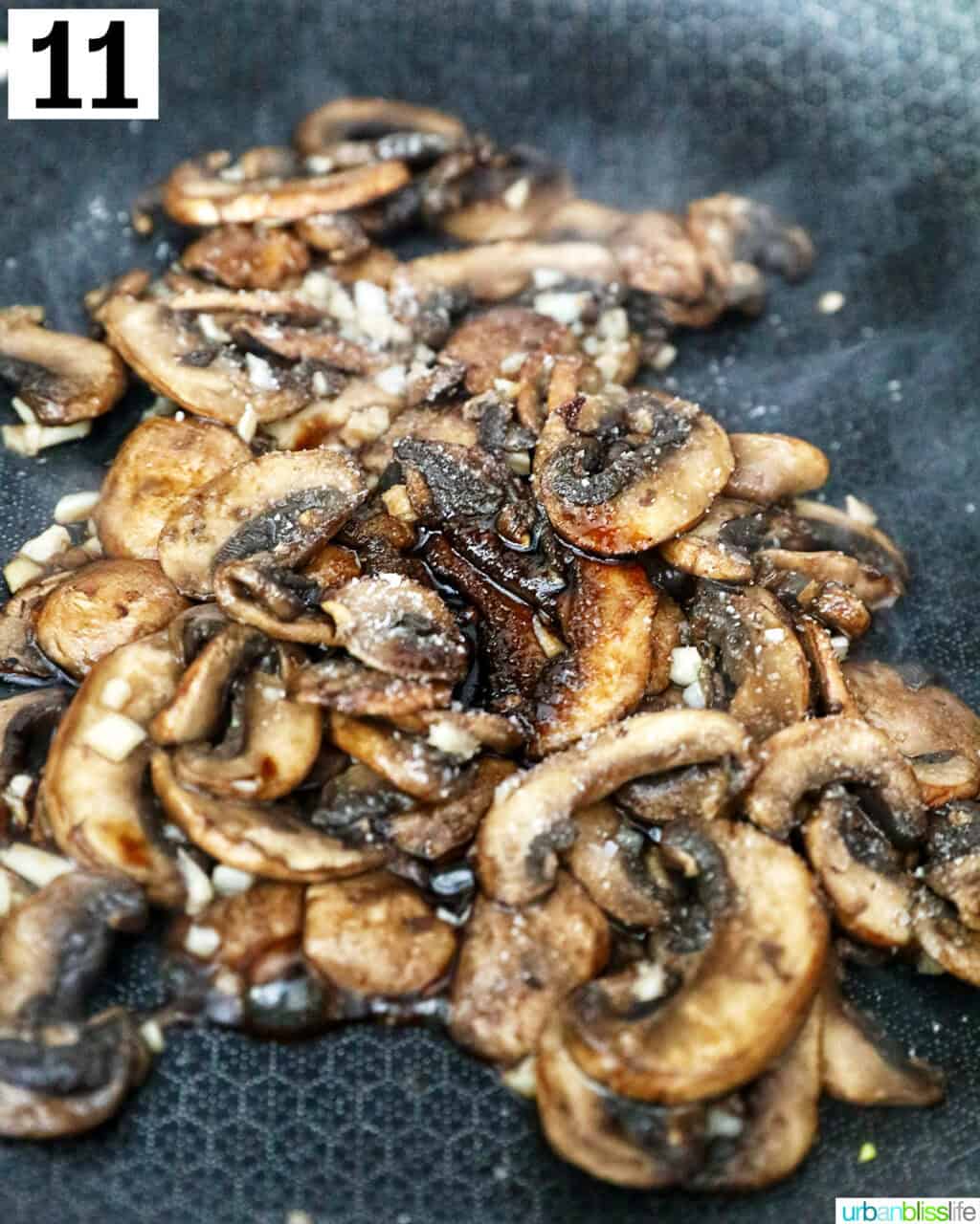 cooked mushrooms in a cast iron skillet.