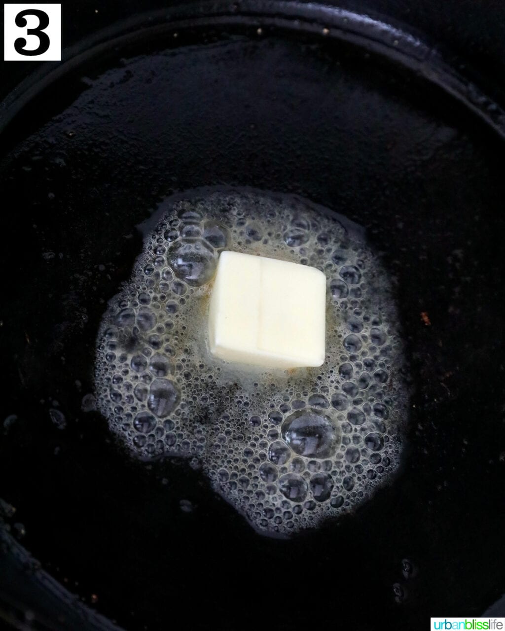 butter melting on a cast iron skillet.