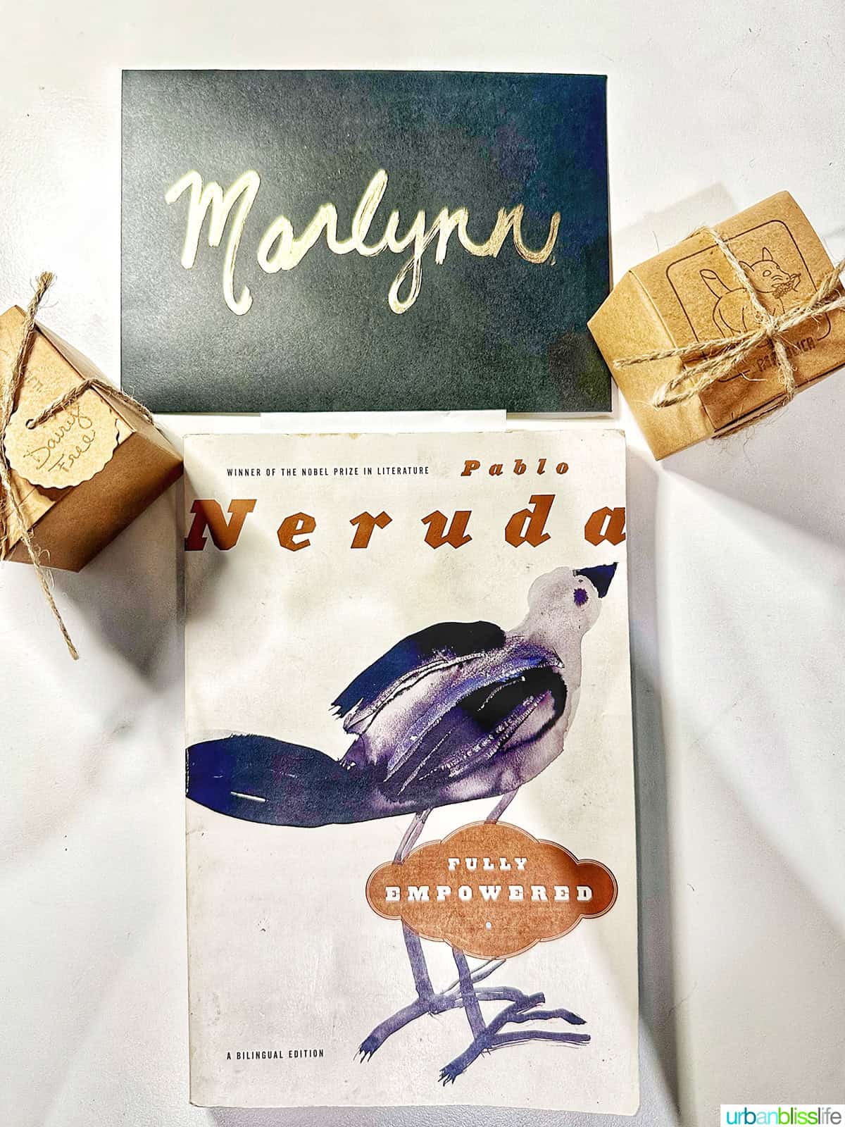 Pablo Neruda book with two boxed treats.
