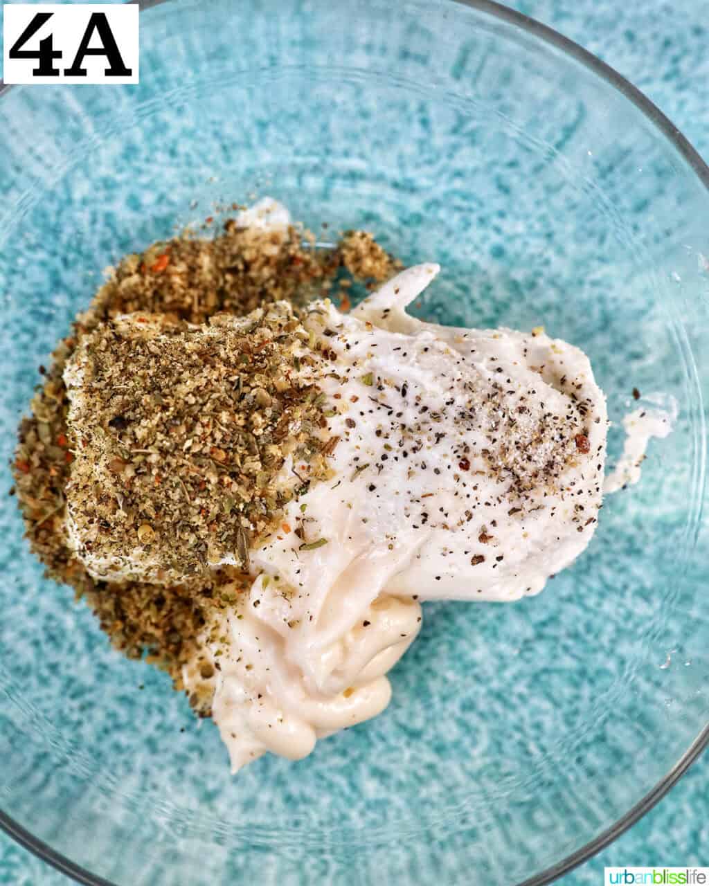 ingredients to make goat cheese spread in a bowl.