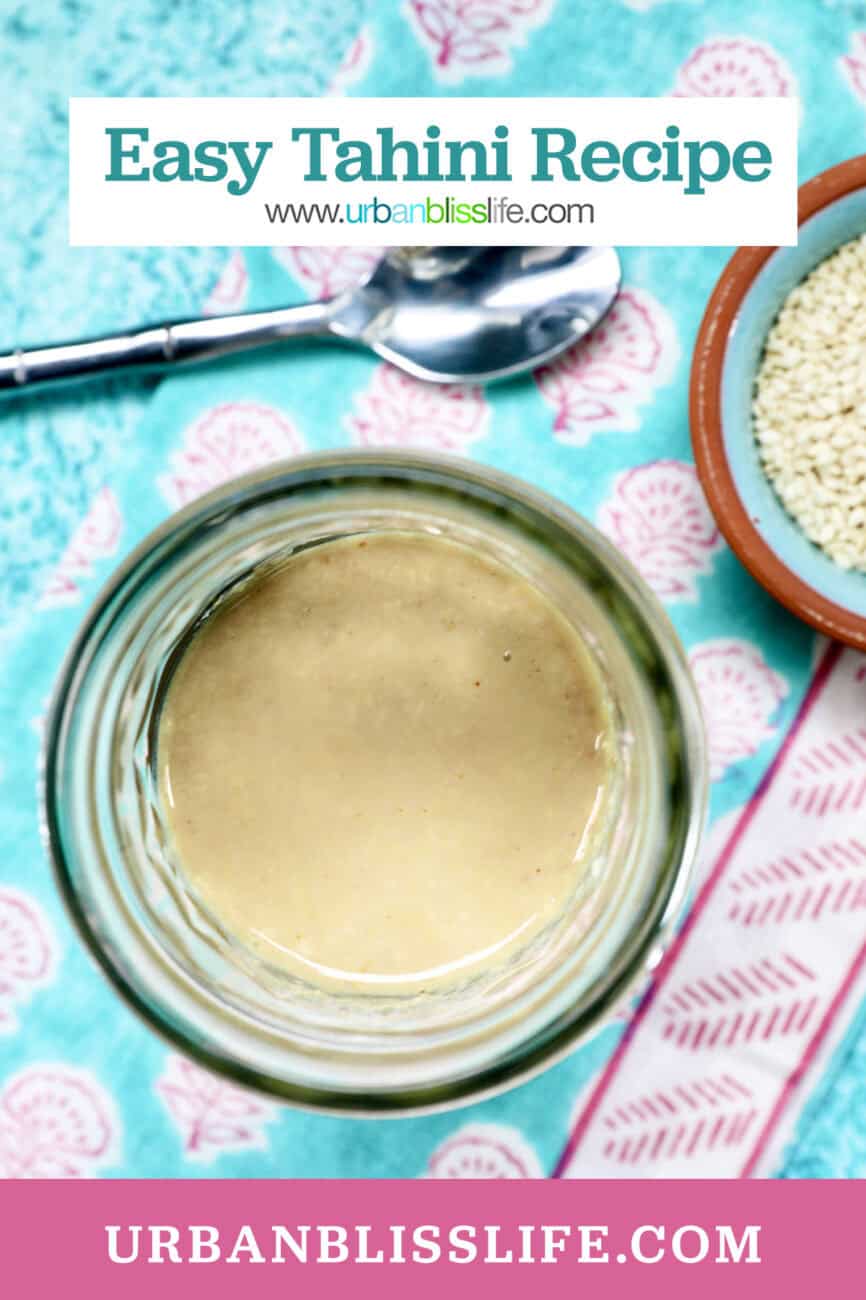 jar of homemade tahini with a small bowl of sesame seeds and a spoon with title text overlay.