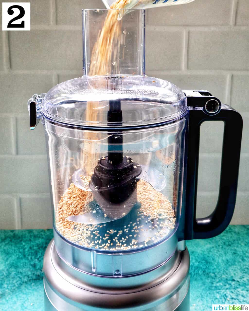 food processor with sesame seeds.