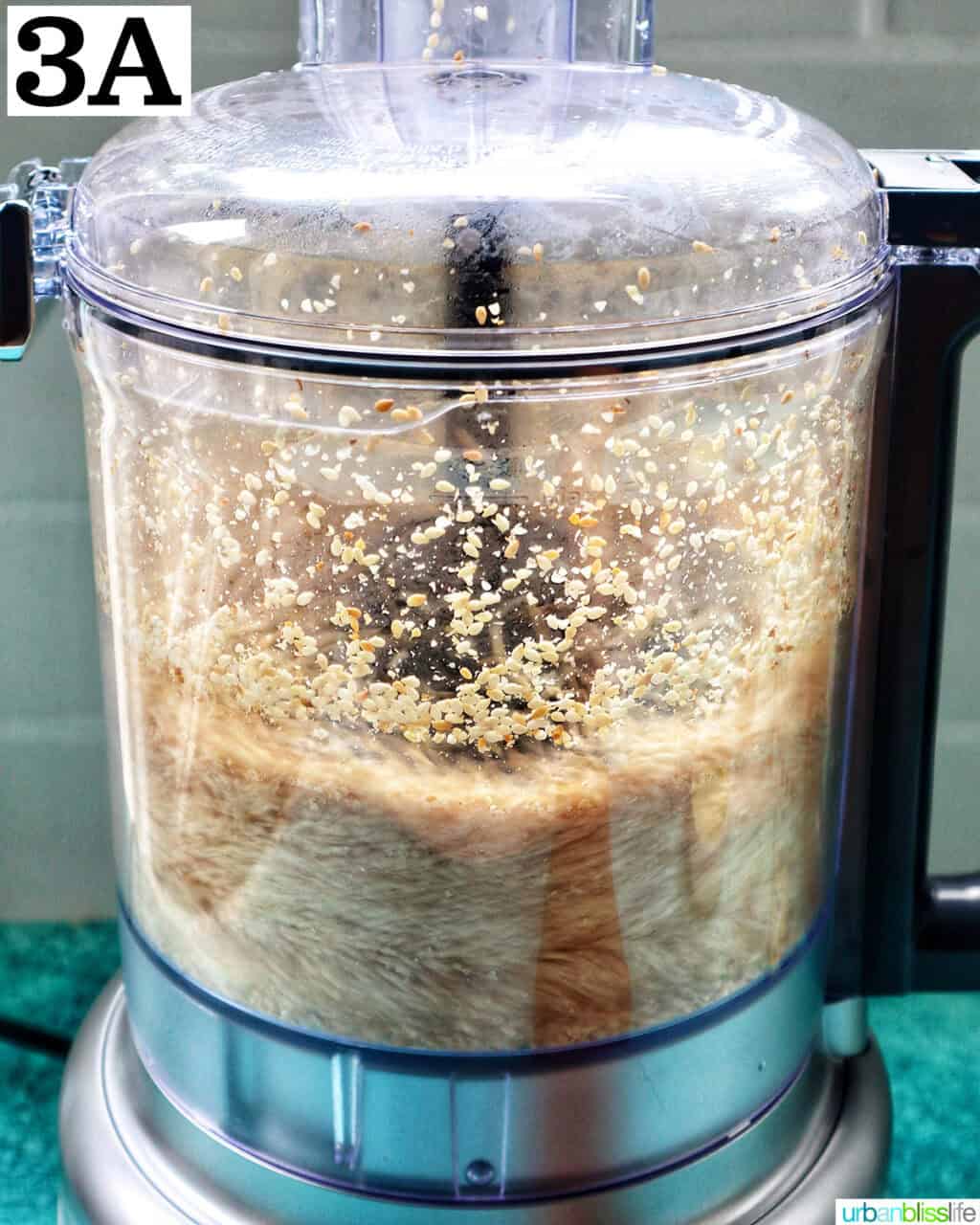 food processor with sesame seeds.