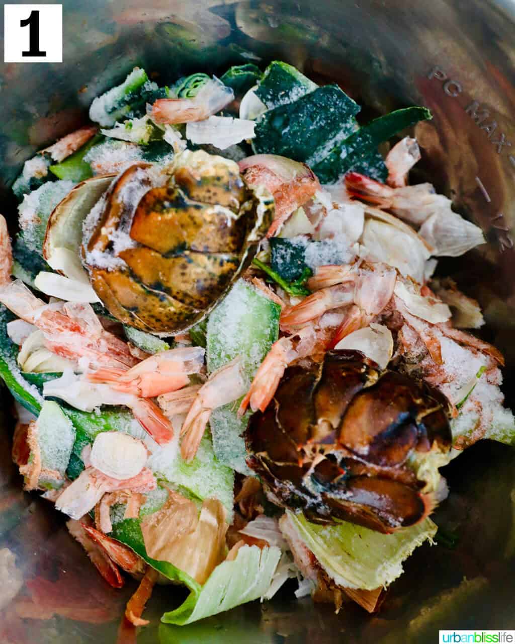 bowl of seafood shells and vegetable scraps to make instant pot seafood stock.