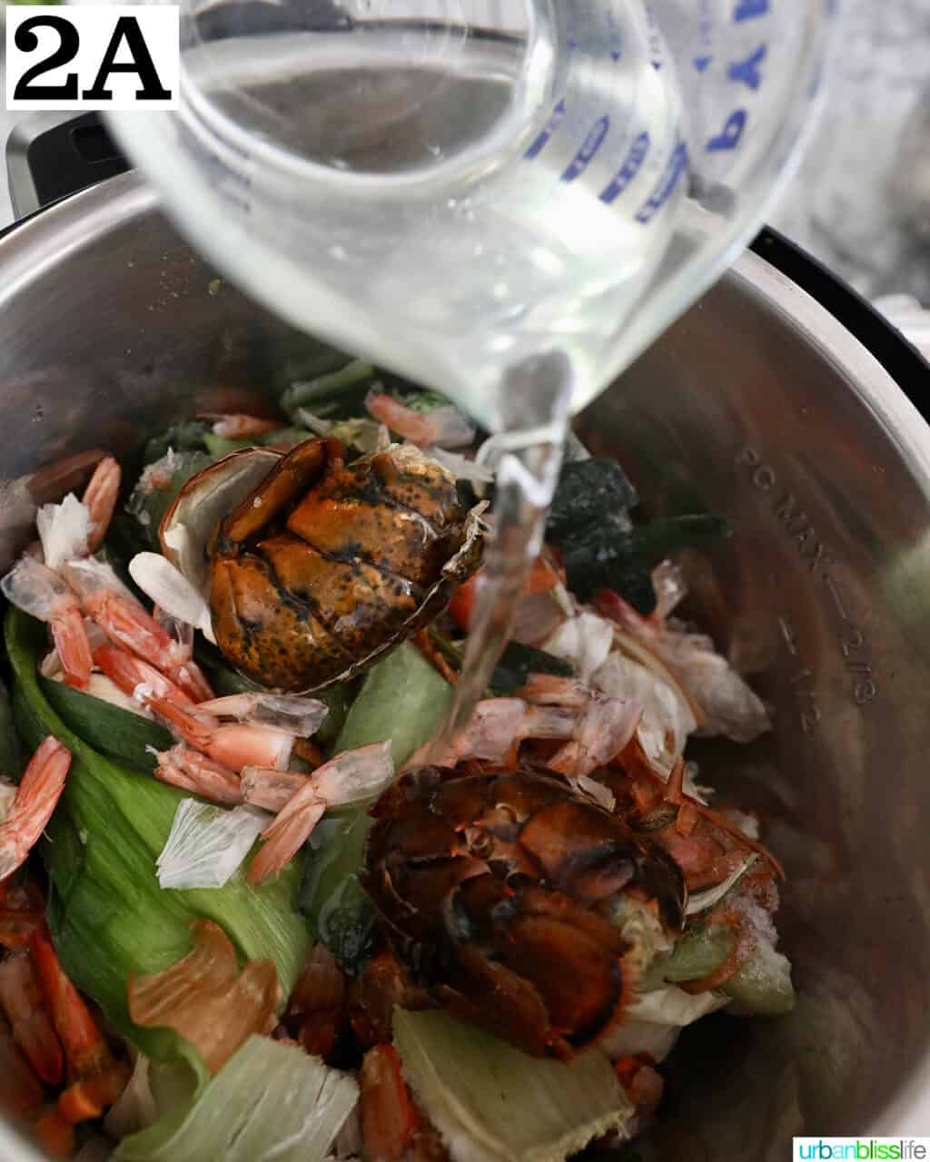 water pouring over Instant Pot of seafood shells and vegetable scraps to make seafood stock.