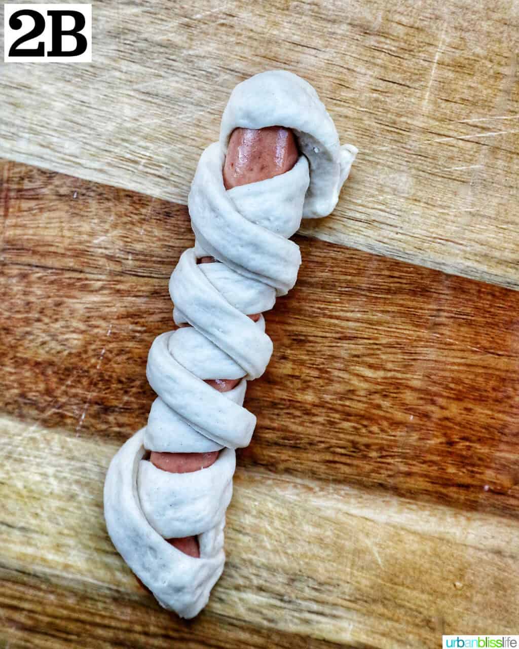 pizza dough wrapped around a hot dog to look like a mummy.