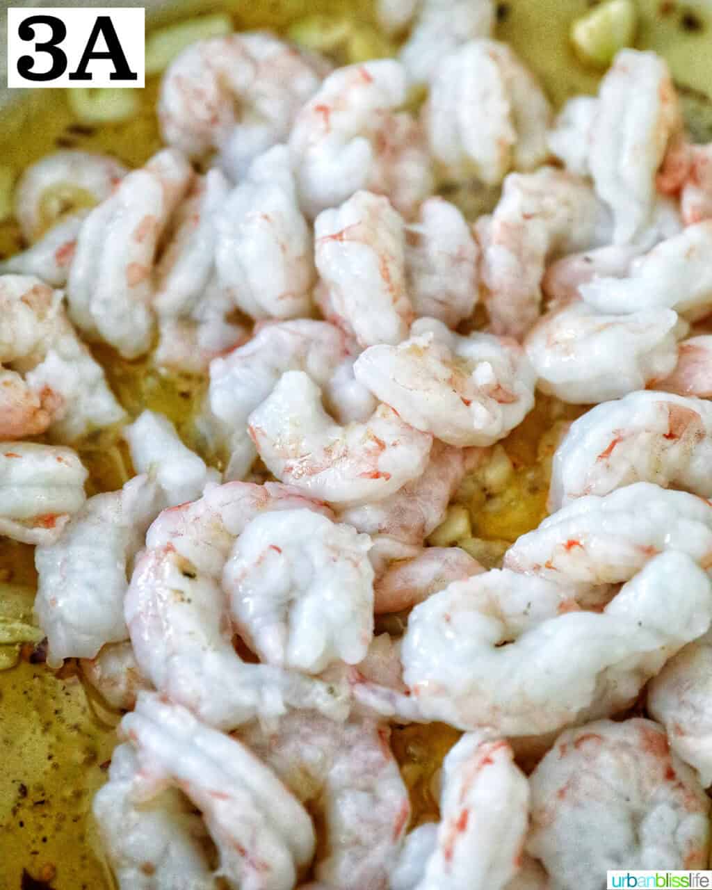 shrimp added to oil and garlic.