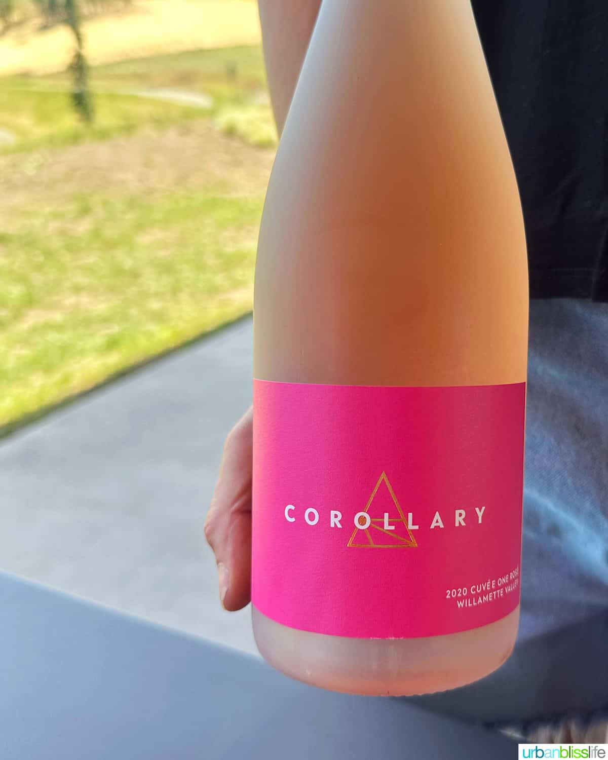 bottle of corollary 2020 sparkling cuvee one rose wine