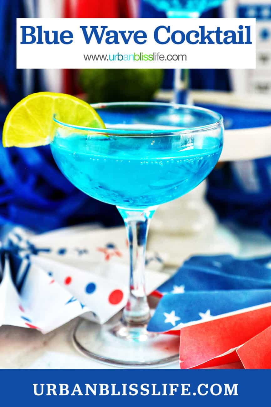 blue wave cocktail with red, white, and blue decorations in the background.