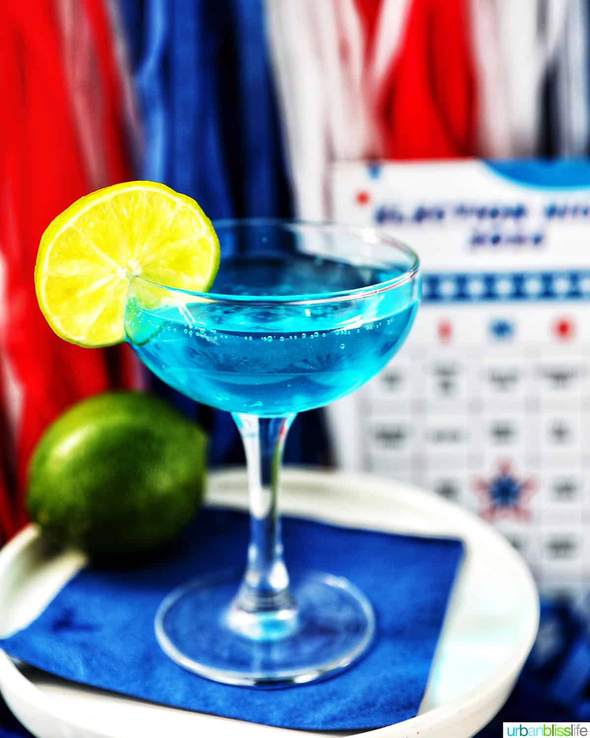 blue wave cocktail with red, white, and blue decorations.