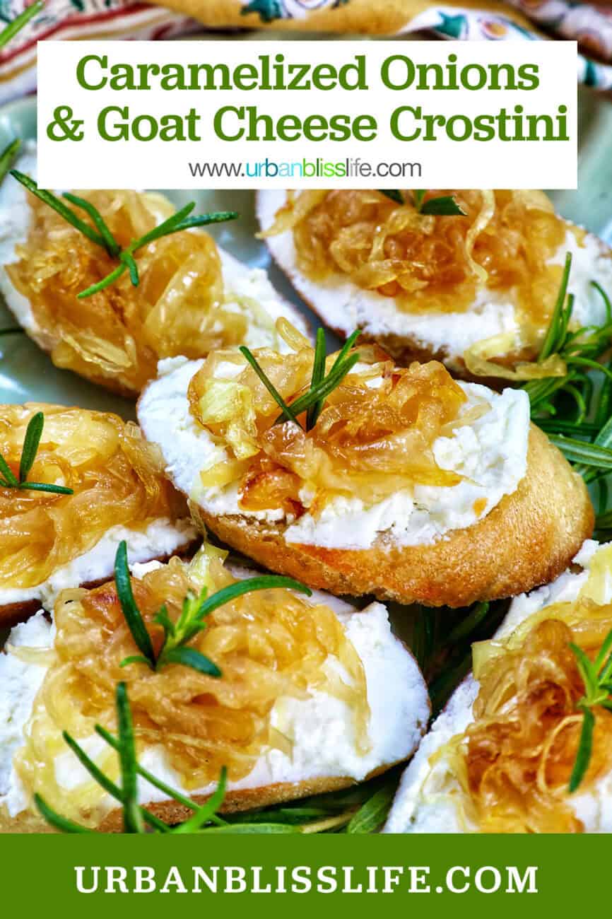 caramelized onions and goat cheese crostini on a plate with rosemary sprig garnish.
