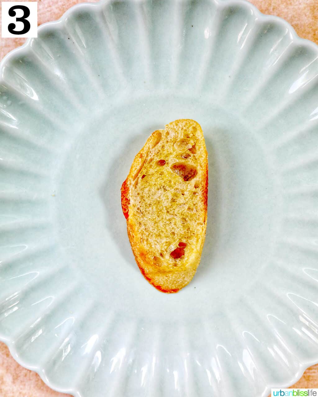 crostini slice on a green plate.