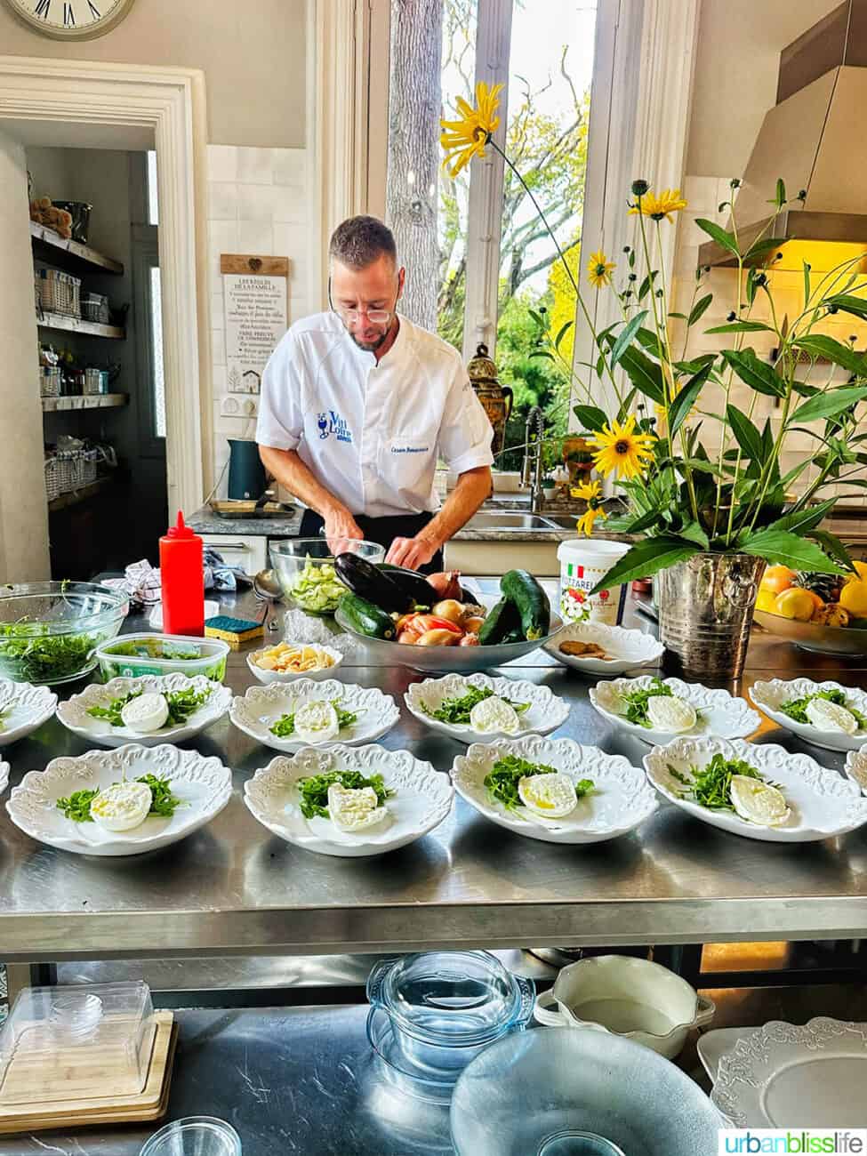 Chef Cesare preparing our dinner in the kitchen at Chateau de Valcreuse.